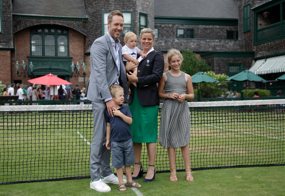 Tennis Hall of Fame inductee Kim Clijsters of Belgium poses with her husband, Brian Lynch, and their children, Jada, right, Jack, left, and baby Blake during enshrinement ceremonies at the International Tennis Hall of Fame, Saturday, July 22, 2017, in Newport, R.I.