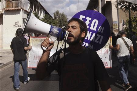 A protester shouts slogans during an anti-fascist rally following the killing of Greek rapper Pavlos Fissas by a supporter of the far-right Golden Dawn group, in Nikaia, a suburb of Athens September 21, 2013. REUTERS/John Kolesidis