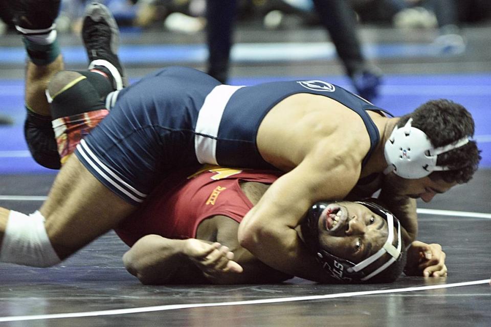 Penn State’s Shayne Van Ness looks for the fall of Iowa State’s Paniro Johnson in their 149-pound second round match of the NCAA Championships on Thursday, March 16, 2023 at the BOK Center in Tulsa, Okla. Van Ness defeated Johnson, 14-8.
