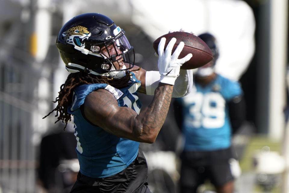 FILE -J acksonville Jaguars wide receiver Laviska Shenault Jr., (10) makes a catch during an NFL football practice, Monday, July 25, 2022, in Jacksonville, Fla. Jaguars receiver Laviska Shenault will make his preseason debut against Pittsburgh on Saturday. It might also serve as an audition for the rest of the league. A second-round draft pick in 2020, Shenault is far from a lock to make the Jaguars' roster. (AP Photo/John Raoux, File)