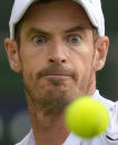 Britain's Andy Murray eyes the ball before playing a return to Australia's James Duckworth in a first round men's singles match on day one of the Wimbledon tennis championships in London, Monday, June 27, 2022. (AP Photo/Kirsty Wigglesworth)