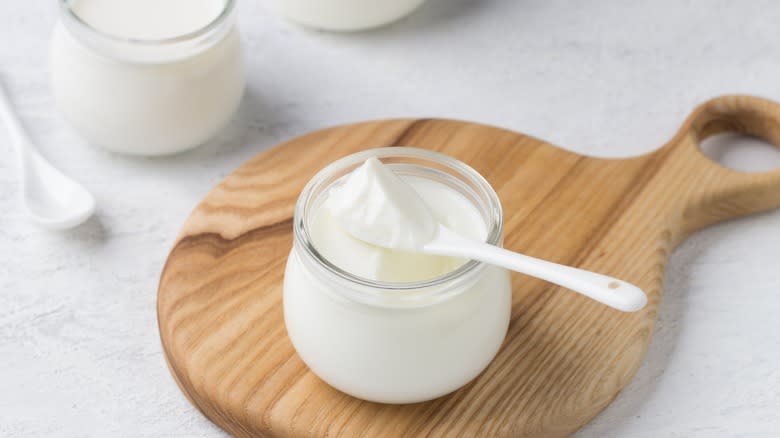 White yogurt in glass bowl