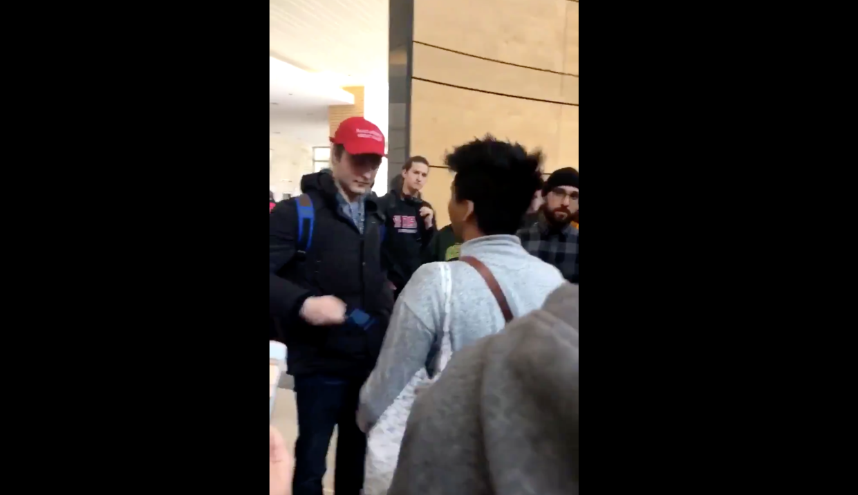 A man wearing a MAGA hat attended a vigil for the victims of the New Zealand mosque victims and he was kicked out by mourners. (Photo: Twitter/raneemayoub)