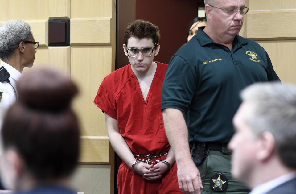 ADDS “SUSPECT” - Parkland school shooting suspect Nikolas Cruz walks into court for a hearing at the Broward Courthouse in Fort Lauderdale, Fla., on Friday, March 22, 2019. (Taimy Alvarez/South Florida Sun-Sentinel via AP, Pool)