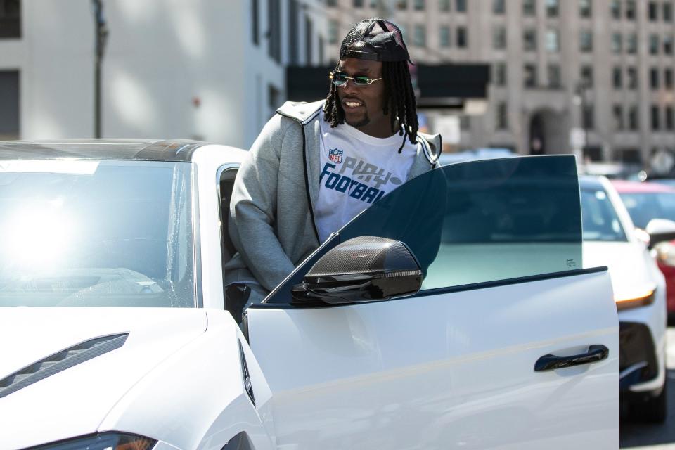 Missouri defensive lineman Darius Robinson gets into a Lamborghini to drive to an event in downtown Detroit before the NFL draft on Thursday, April 25, 2024.