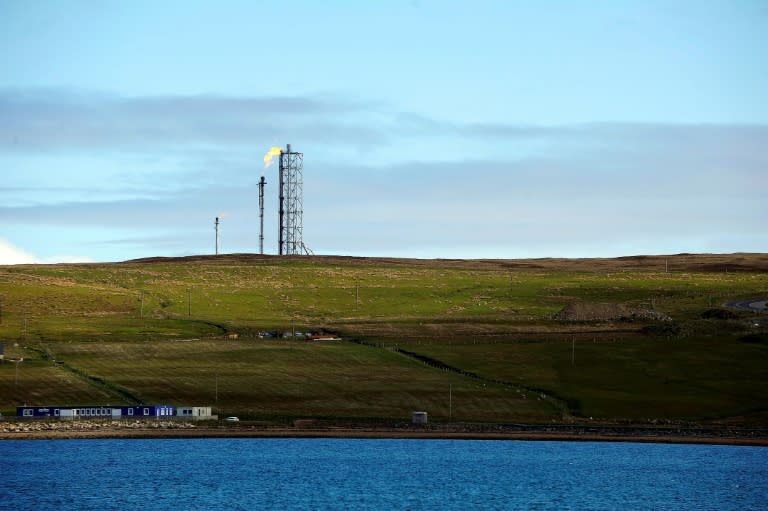 A gas flare burns at the Shetland Gas Plant