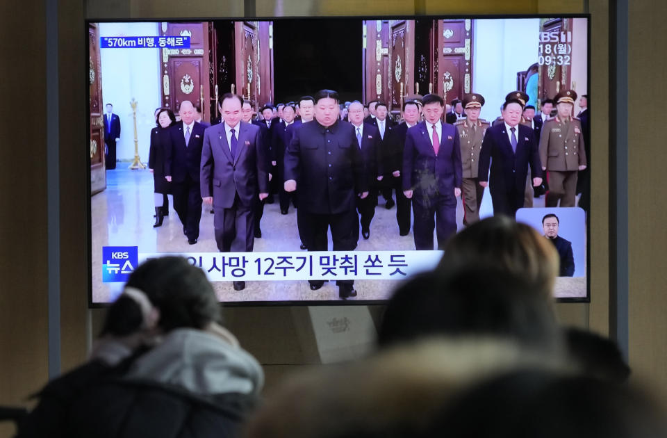 A TV screen shows an image of North Korean leader Kim Jong Un, center, during a news program at the Seoul Railway Station in Seoul, South Korea, Monday, Dec. 18, 2023. North Korea fired an intercontinental ballistic missile into the sea Monday in a resumption of its high-profile weapons testing activities, its neighbors said, as the North vows strong responses against U.S. and South Korean moves to boost their nuclear deterrence plans. (AP Photo/Ahn Young-joon)