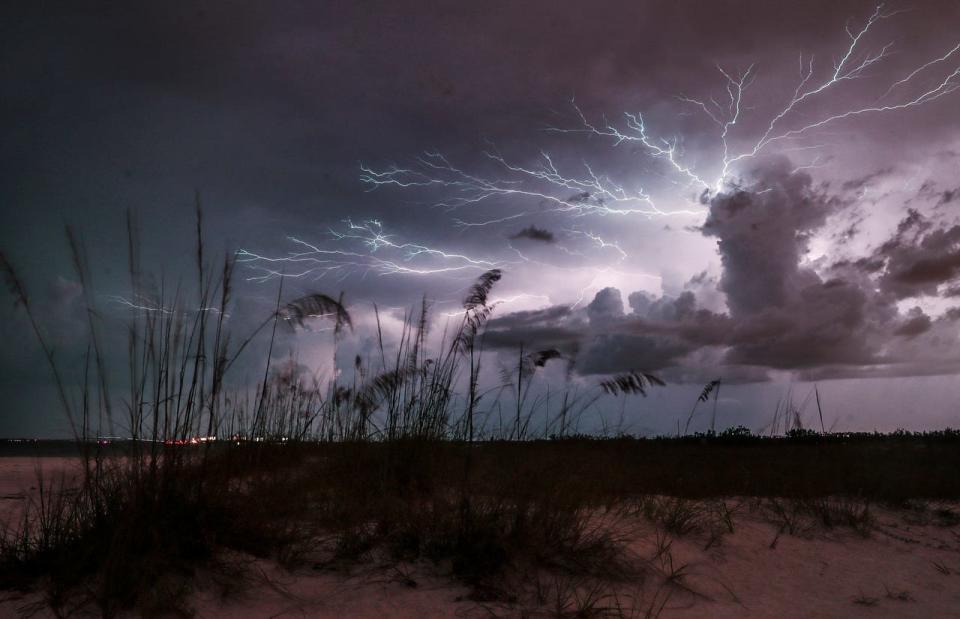 A lightning storm lights up Southwest Florida on Thursday, July 25, 2020. Different types of lightning were observed and photographed including some cases of spider lightning. Photographed from Bowditch Point Park on Fort Myers Beach. Photographed with a Canon 1Dx Mark II set at ISO 500 at 13-15 seconds on a tripod at aperture f/8. 