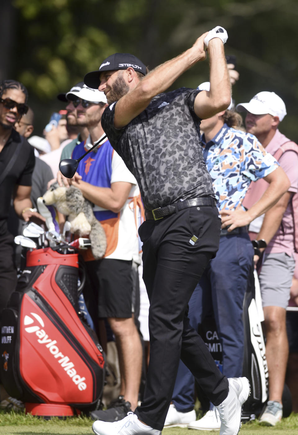 Dustin Johnson tees off on the first hole during the second round of the LIV Golf Invitational-Chicago tournament Saturday, Sept. 17, 2022, in Sugar Grove, Ill. (Joe Lewnard/Daily Herald via AP)