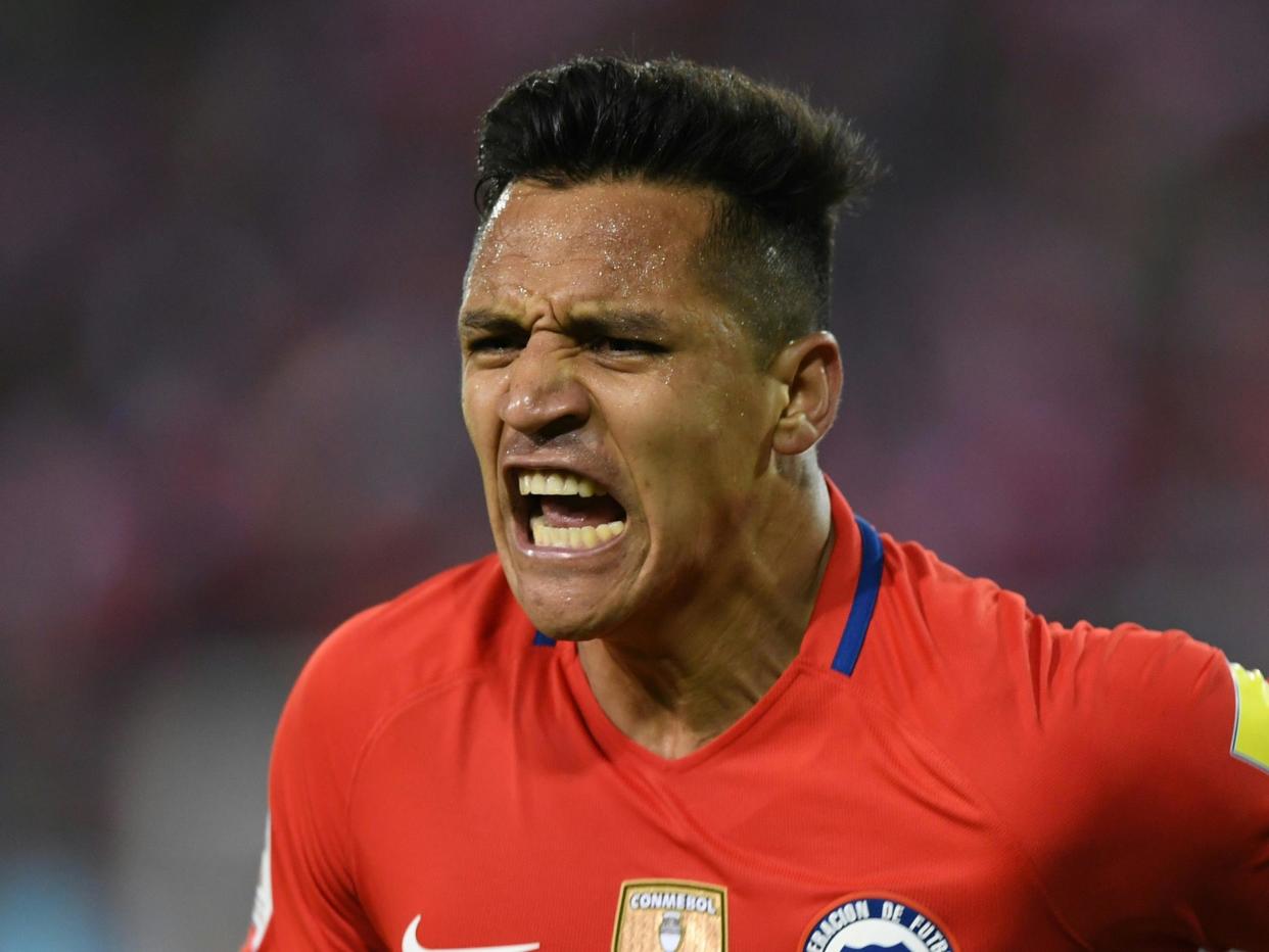 Alexis Sanchez has been away on international duty with Chile: AFP/Getty Images