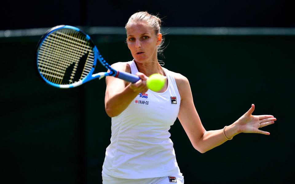 Karolina Pliskova in action on day one of the Wimbledon Championships last year - PA