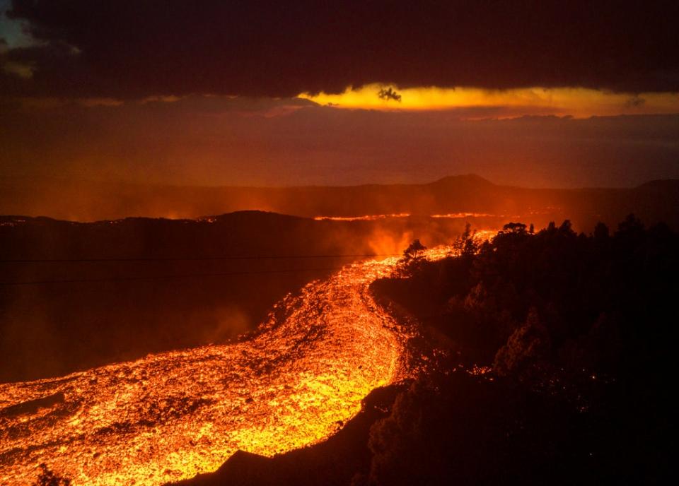 The new lava flows are threatening to widen the impact on evacuated land, infrastructure and homes (AP)