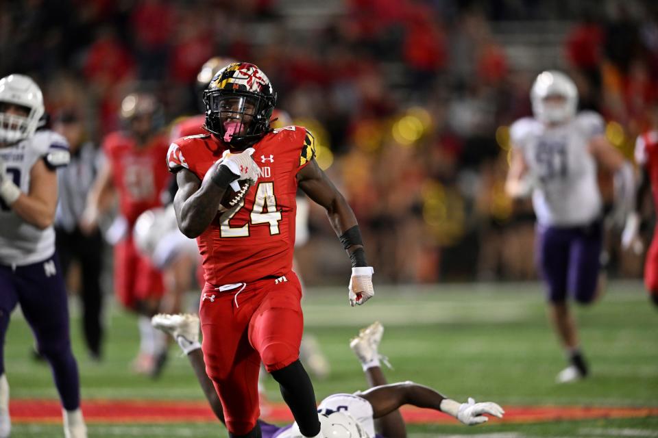 Maryland running back Roman Hemby runs for a touchdown against Northwestern in the second half of an NCAA college football game, Saturday, Oct. 22, 2022, in College Park, Md. Maryland won 31-24. (AP Photo/Gail Burton)