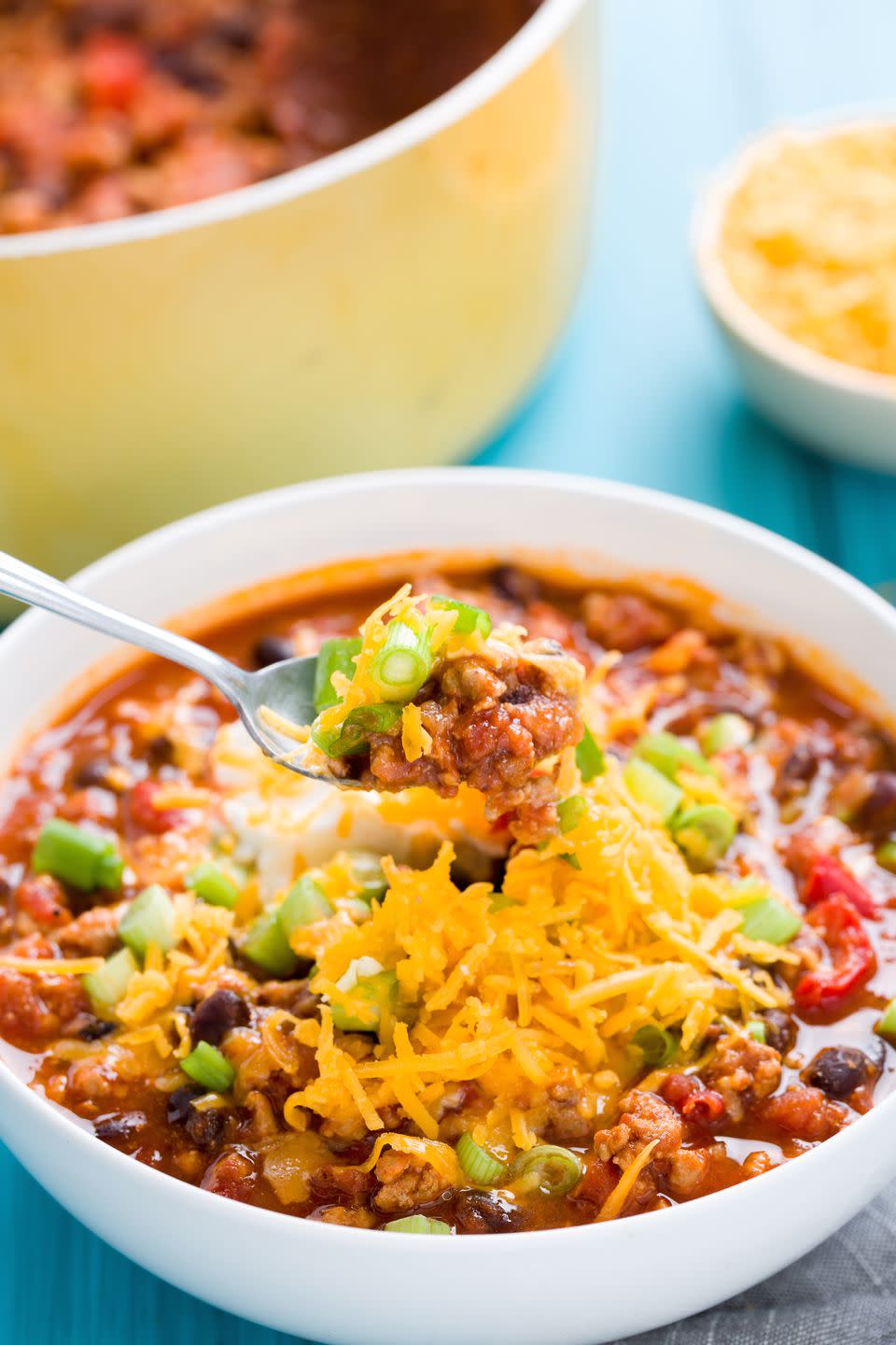 <p>Grab your slow cooker and cozy on up. </p><p>Get the recipe from <a href="https://www.delish.com/cooking/recipe-ideas/recipes/a55200/easy-turkey-slow-cooker-chili-recipe/" rel="nofollow noopener" target="_blank" data-ylk="slk:Delish;elm:context_link;itc:0;sec:content-canvas" class="link ">Delish</a>.</p>