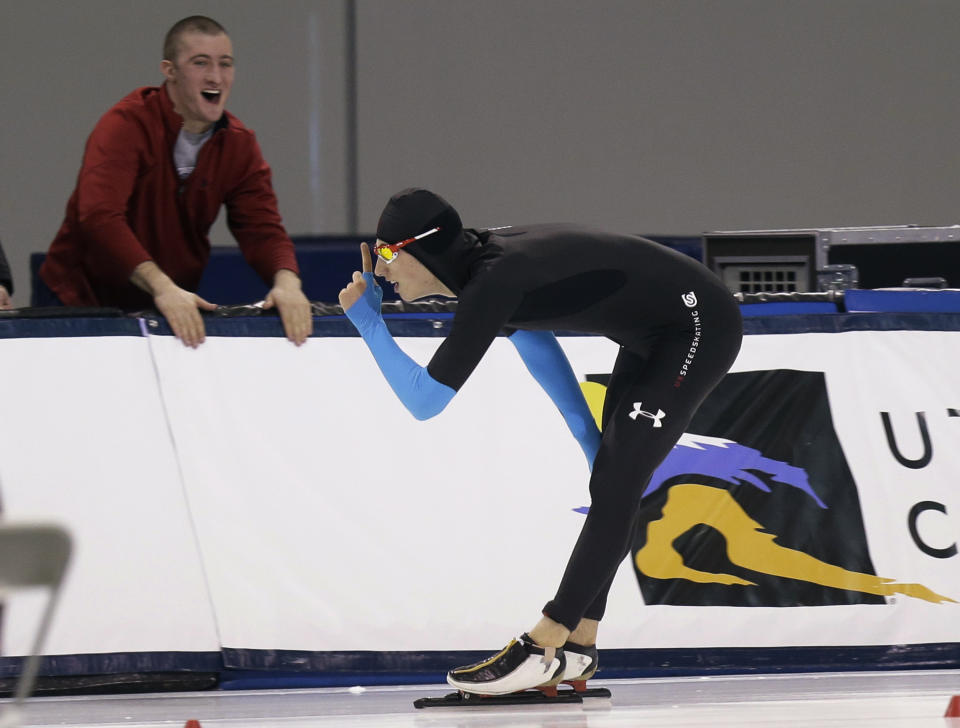 Emery Lehman celebrates after competing in the men's 10,000 meters during the U.S. Olympic speedskating trials Wednesday, Jan. 1, 2014, in Kearns, Utah. Lehman won the event. (AP Photo/Rick Bowmer)