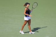 Madison Keys, of the United States, reacts to losing a point to Iga Swiatek, of Poland, during the Western & Southern Open tennis tournament, Thursday, Aug. 18, 2022, in Mason, Ohio. (AP Photo/Aaron Doster)