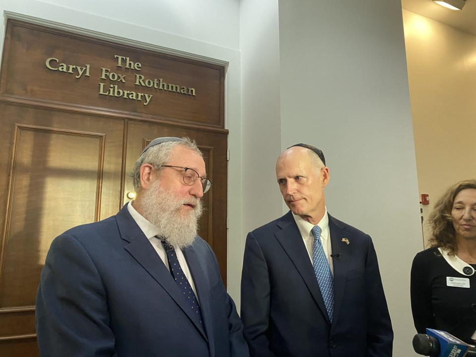 U.S. Sen. Rick Scott, right, stands with Rabbi Moshe Denburg of Chabad in Boca Raton after a roundtable on the Hamas attacks on Israel las October.
(Credit: Stephany Matat)