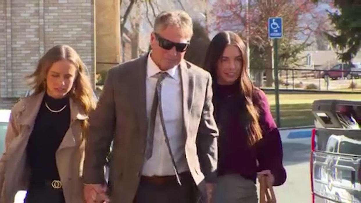 Barry Morphew pleaded not guilty to all charges and on September 20, 2021, he was released from jail on bond with his daughters by his side. They steadfastly support their father, attending most of his court hearings like this one in December 2021. / Credit: KKTV