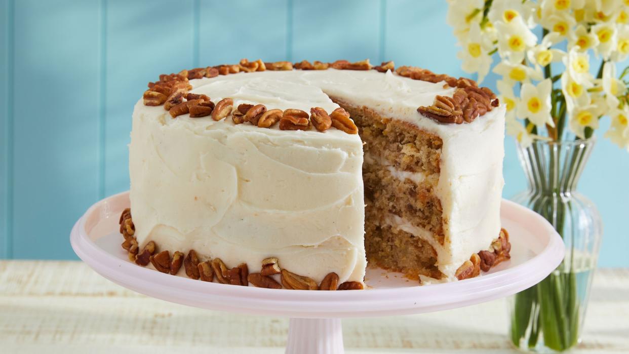 a hummingbird layer cake sits on a plate