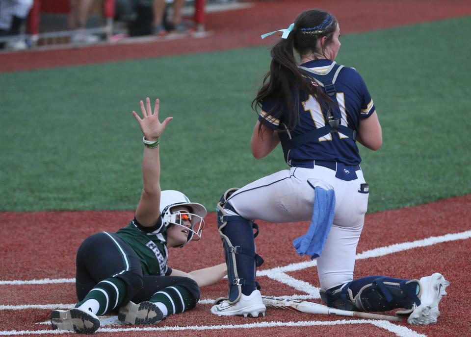 Tallmadge catcher Lexi Gray makes the tag last season in a Division II state semifinal.