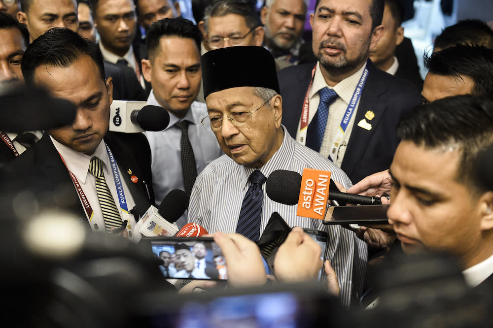 Prime Minister Tun Dr Mahathir Mohamad speaks to reporters during the Kuala Lumpur Summit 2019 December 20, 2019. — Picture by Miera Zulyana