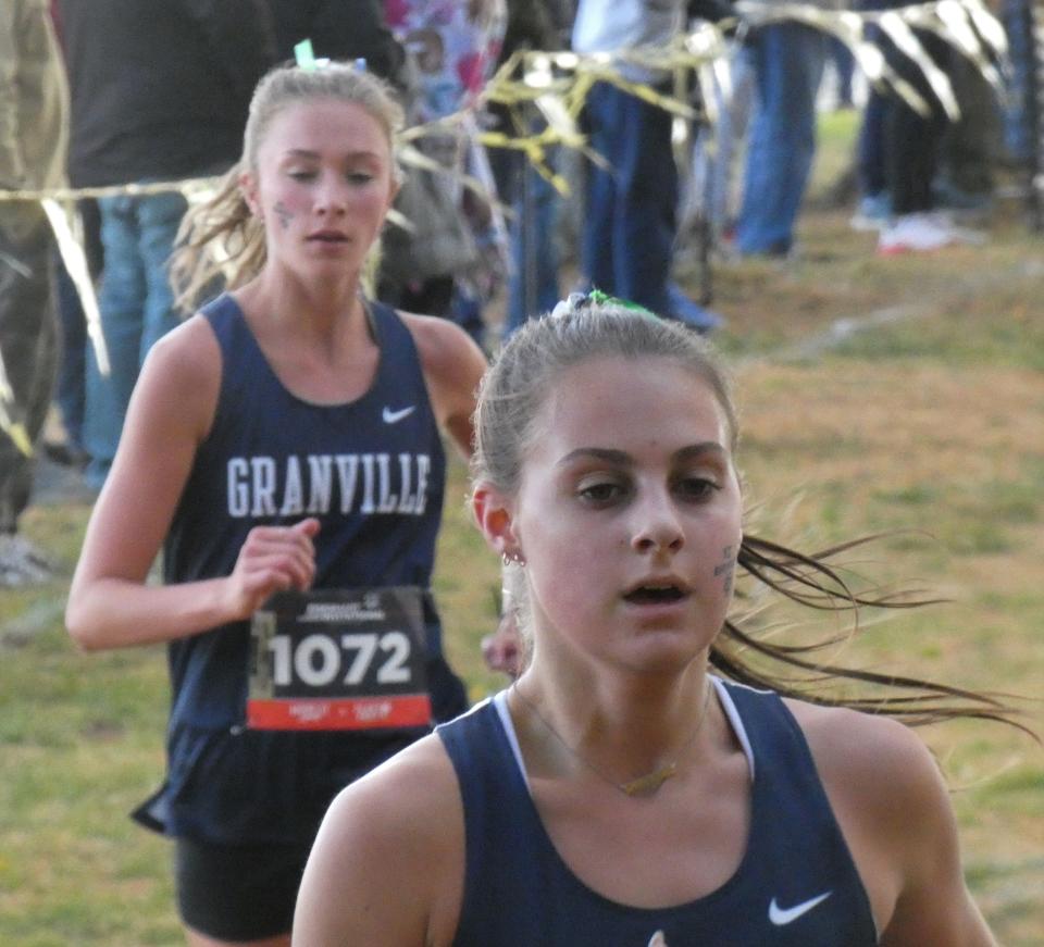Granville seniors Zoee Lehman, front, and Ella Johnson, back, lead the Licking County League championships at Watkins Memorial on Saturday, Oct. 15, 2022. Lehman and Johnson took the top two spots for the Buckeye Division champion Blue Aces.