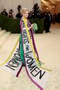 Like AOC, U.S. Representative Carolyn Maloney decided to make a major, clear statement with her dress at the Met Gala. And like all political statements, it made quite some noise.