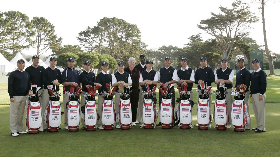 Glover (third left) and Johnson (fourth left) were part of the victorious US Team at the 2009 Presidents Cup at the Harding Park Golf Club in San Francisco, California. - Robert Galbraith/Reuters