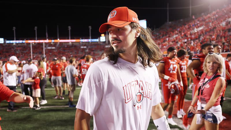 Injured Utah quarterback Cameron Rising walks off the field after the Utes victory in Salt Lake City on Thursday, Aug. 31, 2023 during the season opener. Utah won 24-11.