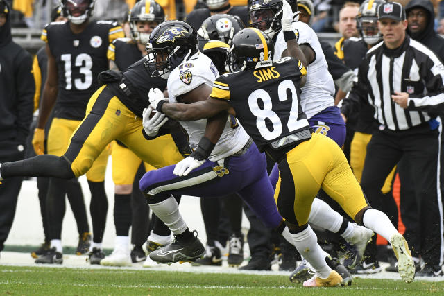 JK Dobbins rushes for over 100 yards with TD, Ravens skirt by rival Steelers