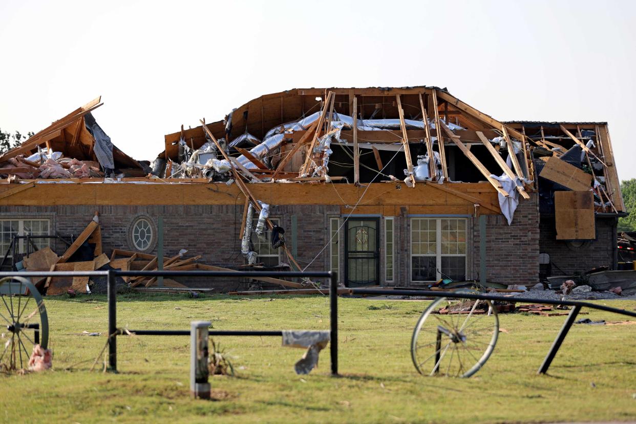 Storm damage to a home is seen May 20 in Oklahoma City. A possible tornado came through the area near Cimarron Road and NW 10.