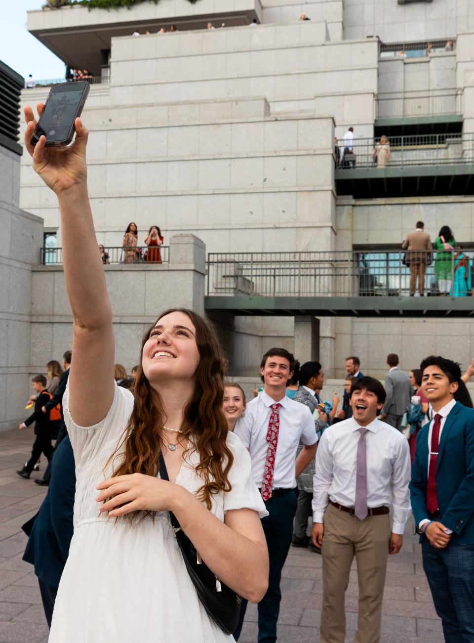 Claire Little takes a selfie with her friends after the final session of the 193rd Semiannual General Conference of The Church of Jesus Christ of Latter-day Saints at the Conference Center in Salt Lake City on Sunday, Oct. 1, 2023. | Megan Nielsen, Deseret News