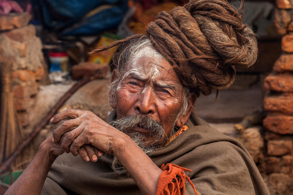 KATHMANDU, NEPAL - FEBRUARY 17:  A Shadu, or holy man, sits inside Pashupatinath temple during the celebration of the Maha Shivaratri festival on February 17, 2015 in Kathmandu, Nepal.