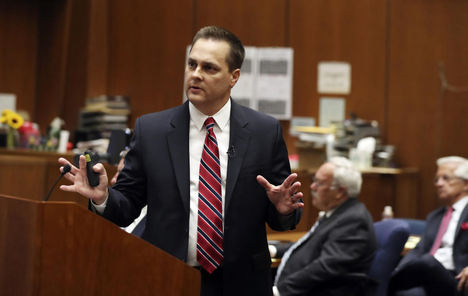 Deputy District Attorney Garrett Dameron presents closing arguments in the People vs. Michael Gargiulo trial Tuesday, Aug. 6, 2019, in Los Angeles. Closing arguments started Tuesday in the trial of an air conditioning repairman charged with killing two Southern California women and attempting to kill a third. (Lucy Nicholson, Pool Photo via AP)