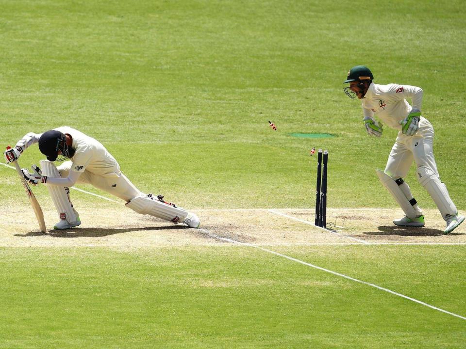 Moeen Ali is stumped by Tim Paine off Nathan Lyon's bowling (Getty)