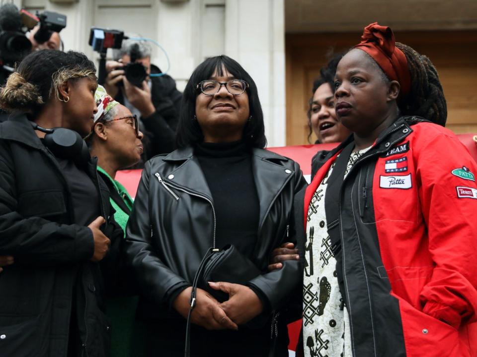 Diane Abbott stands on the steps of Hackney Town Hall on Wednesday (Getty Images)