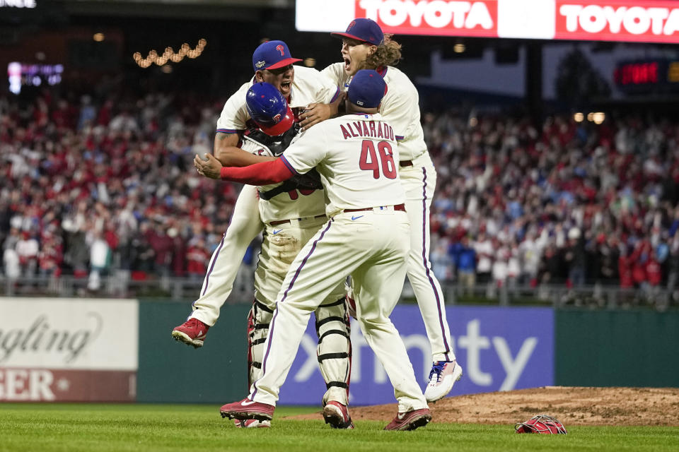 The Philadelphia Phillies celebrate after winning the baseball NL Championship Series against the San Diego Padres in Game 5 on Sunday, Oct. 23, 2022, in Philadelphia. (AP Photo/Matt Slocum)