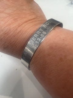 The bracelet remembering Capt. Jerry Roe, a helicopter pilot who, along with his crew of three other American servicemen, disappeared in the jungles of Vietnam in February 1968.