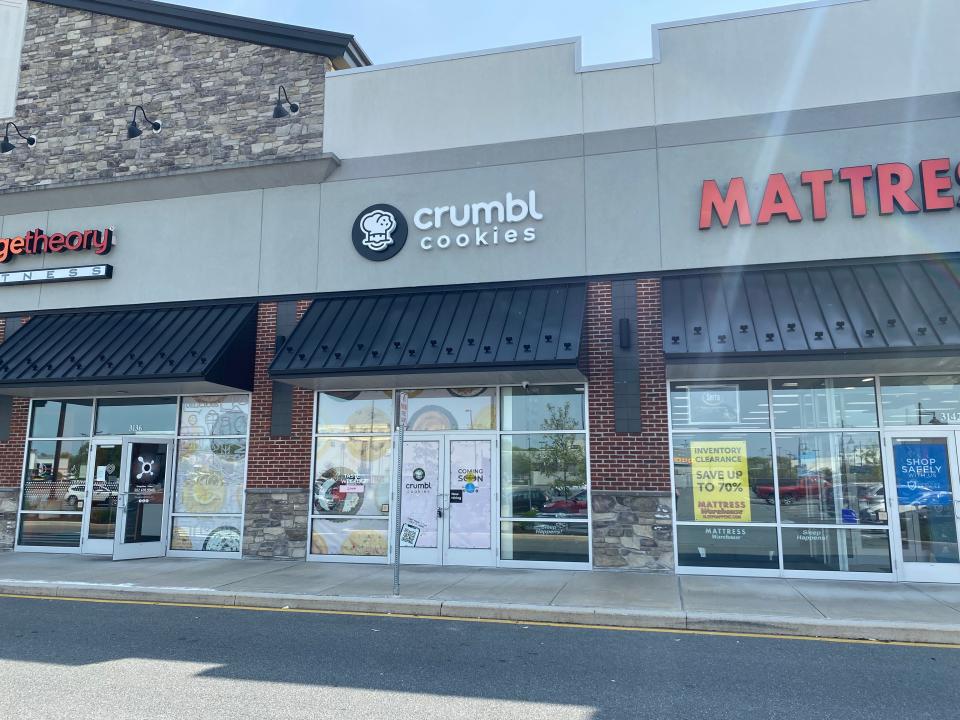 Crumbl Cookies under construction in the Christiana Fashion Center on May 11, 2023.