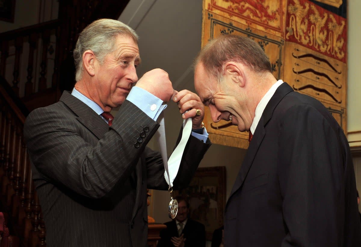 The Prince of Wales with Roger De Haan CBE, as he presents him with the Prince of Wales Medal for Arts Philanthropy at Clarence House in central London in 2008 (PA)