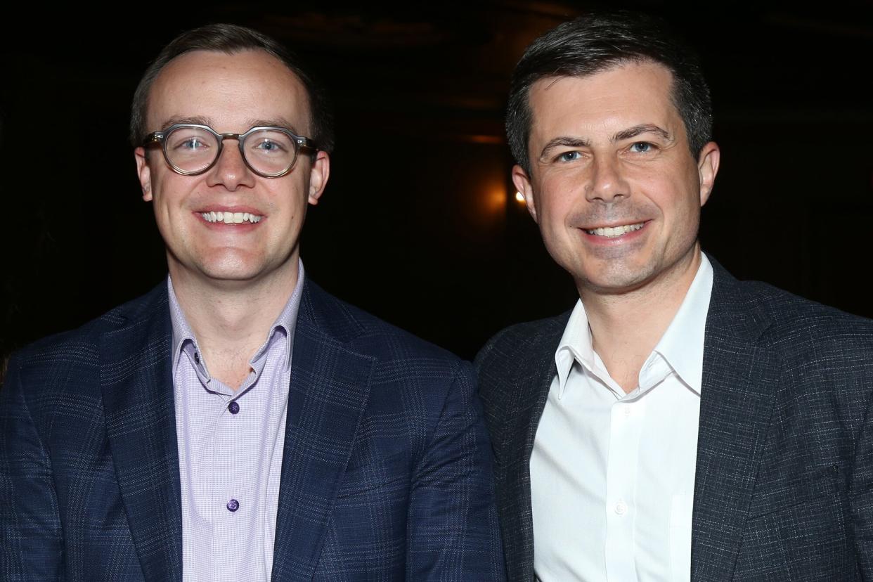 Chasten Buttigieg and husband United States Secretary of Transportation Pete Buttigieg pose backstage at "Into The Woods" on Broadway at The St. James Theater on October 22, 2022 in New York City.