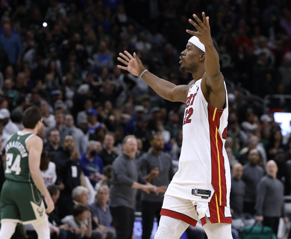 Miami Heat forward Jimmy Butler reacts in the closing seconds of the second half of Game 5 in the team's first-round NBA basketball playoff series against the Milwaukee Bucks on Wednesday, April 26, 2023, in Milwaukee. The Heat won 128-126 in overtime, eliminating the Bucks from the playoffs. (AP Photo/Jeffrey Phelps)