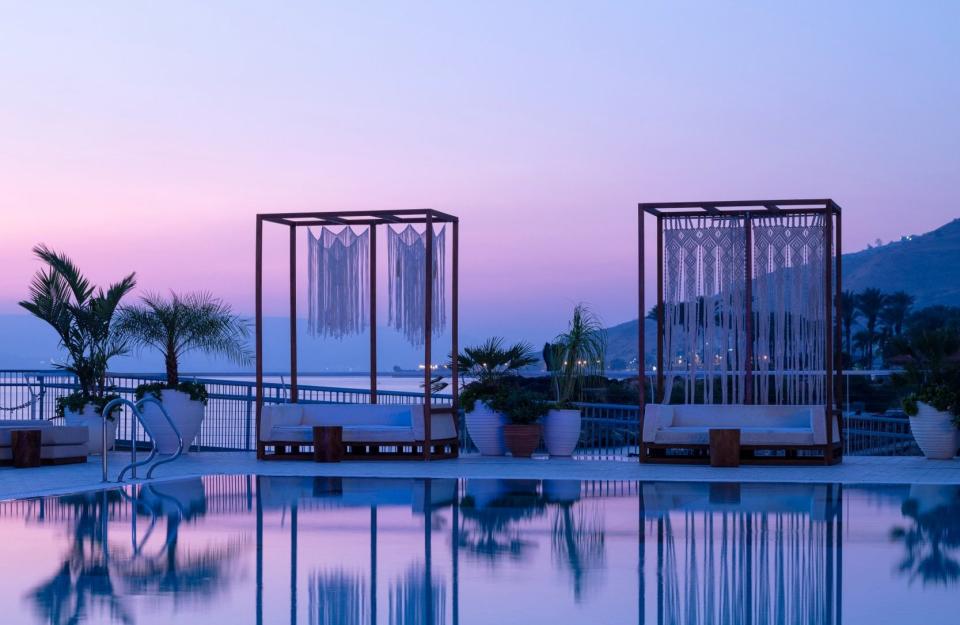 The pool at dusk at Galei Kinneret - AMIT GERON