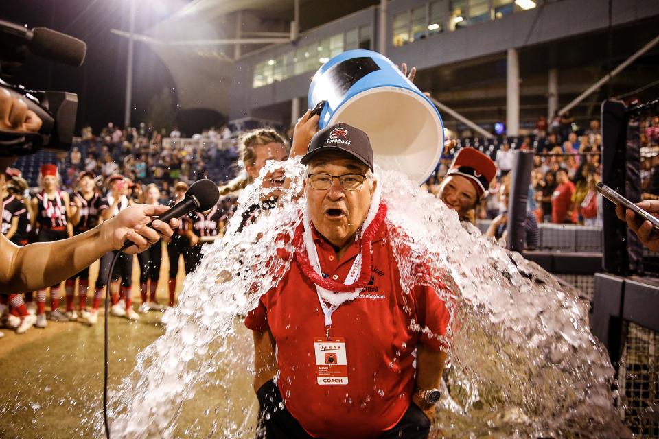 Bear River head coach Calvin Bingham gets doused with water
