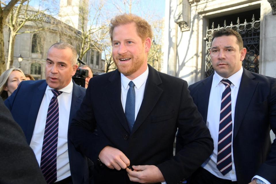 Prince Harry arrives at the High Court in London, wearing a skinner tie than usual (REUTERS)