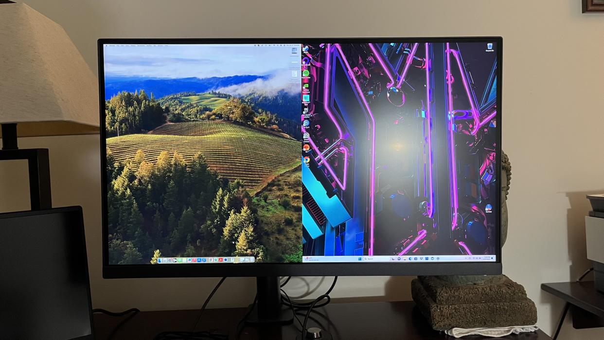  A BenQ PD2705UA monitor on a desk. 