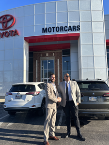 Pictured left to right: Matt Gile shakes hands with new owner Chad Martin following the sale of the Motorcars Toyota Dealership in Cleveland Heights, OH on March 8, 2023.