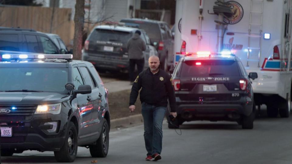 A gunman opened fire at an Illinois factory just after receiving notice of termination from his job there on Friday, killing five fellow workers and wounding five policemen before he was slain by police (REUTERS)