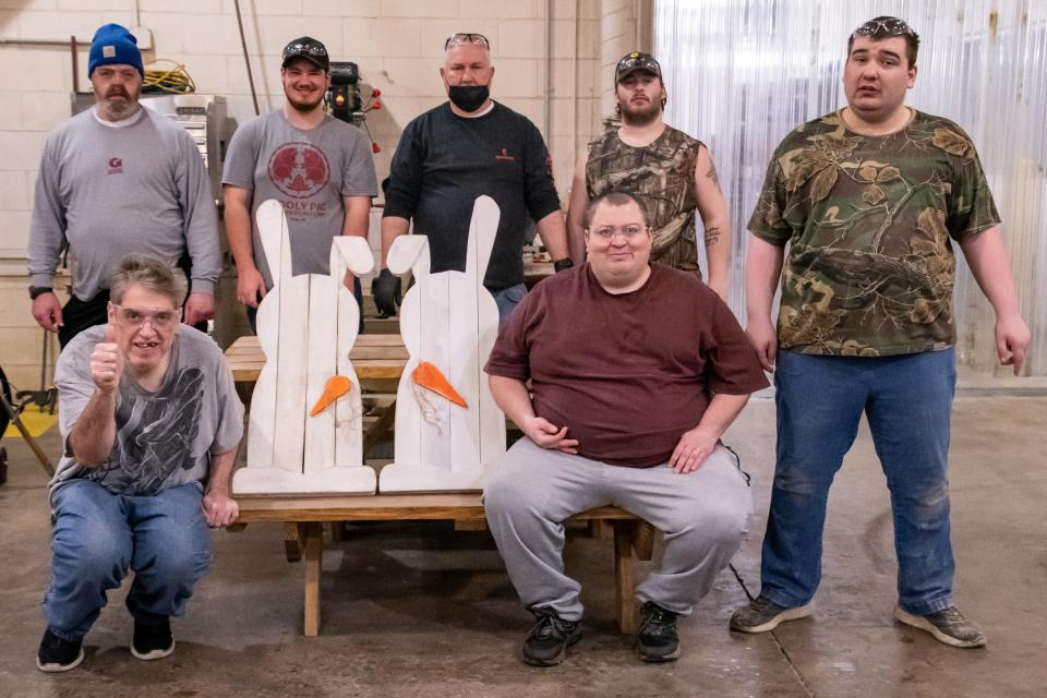 The pallet floor team with some of the custom Easter pieces that will be available at the Home, Garden and Business Expo.