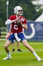 Indianapolis Colts quarterback Carson Wentz runs a drill during practice at the NFL team's football training camp in Westfield, Ind., Wednesday, July 28, 2021. (AP Photo/Michael Conroy)